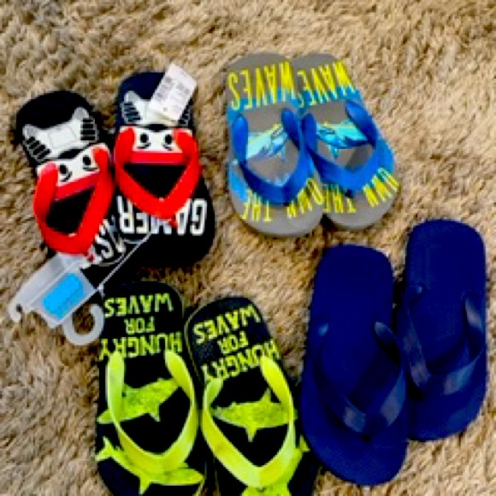 Brand new flip flops.    4 pairs.  Size 13.